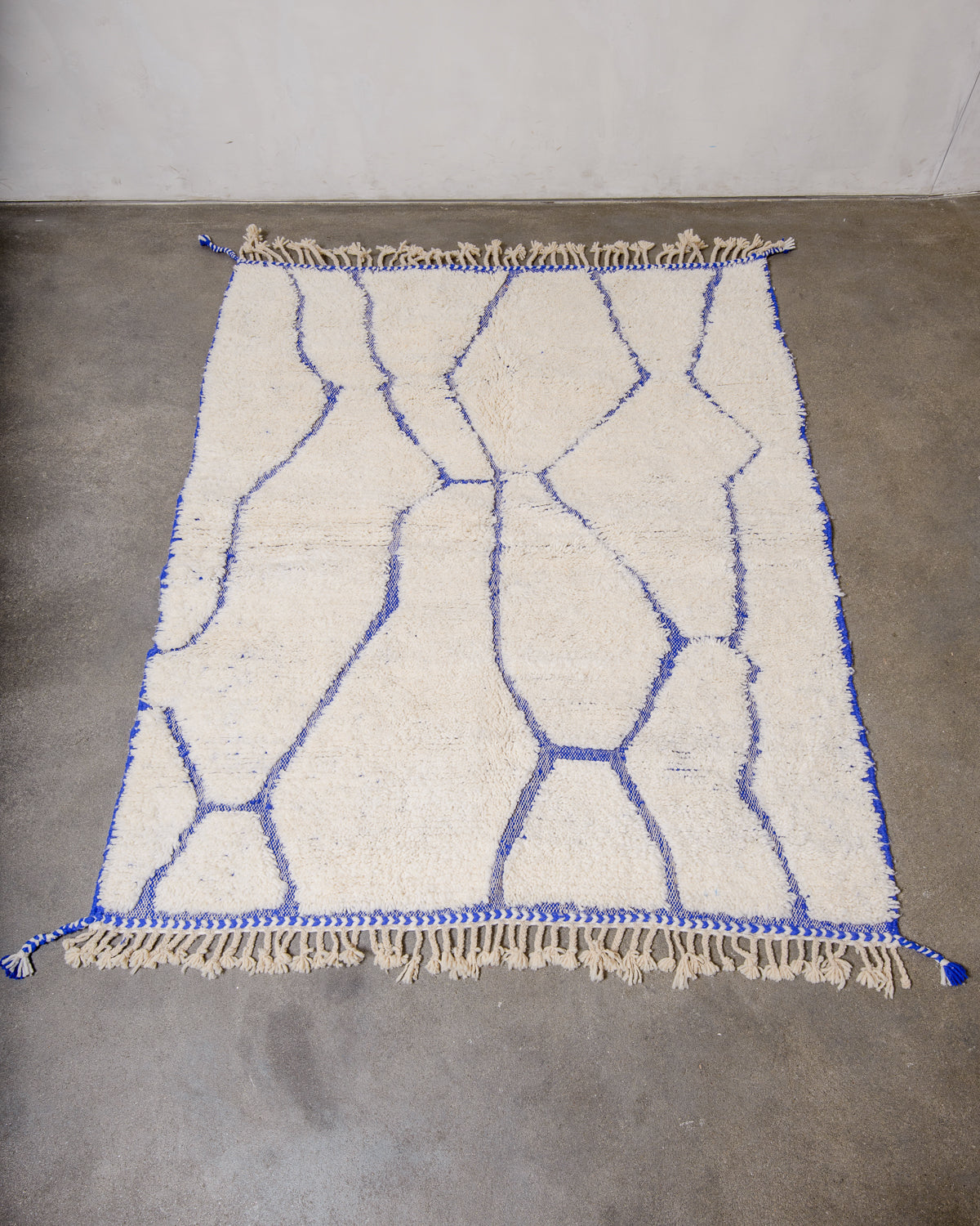 Modern, designer, handcrafted Berber rug from Morocco. Beniourain carpet with beautiful colours and patterns and fluffy wool texture.